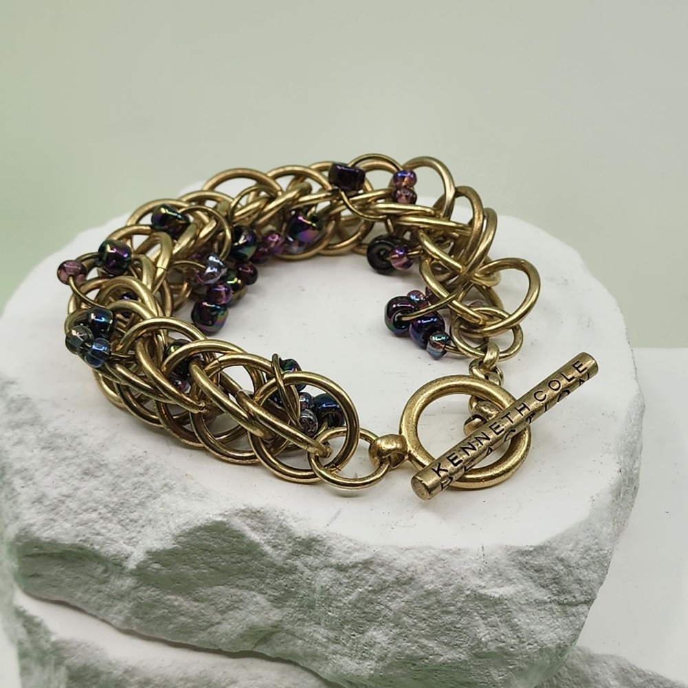 Kenneth Cole Gold Tone Woven Ring Bracelet Purple Bead Chunky Toggle Statement